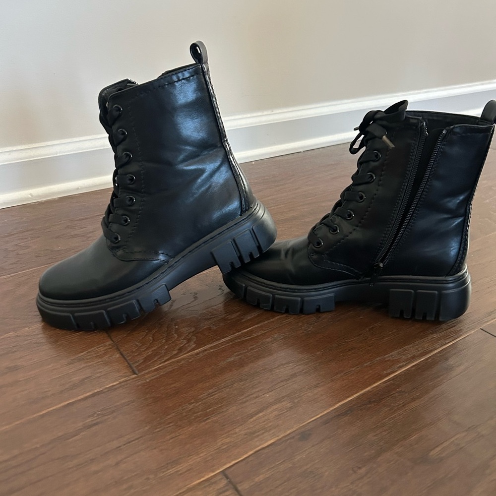 Limelight black lace up boot with zipper.  Size 6.